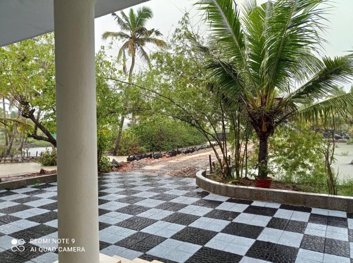 Aqua Green Home Stay Munroe Island Bagian luar foto