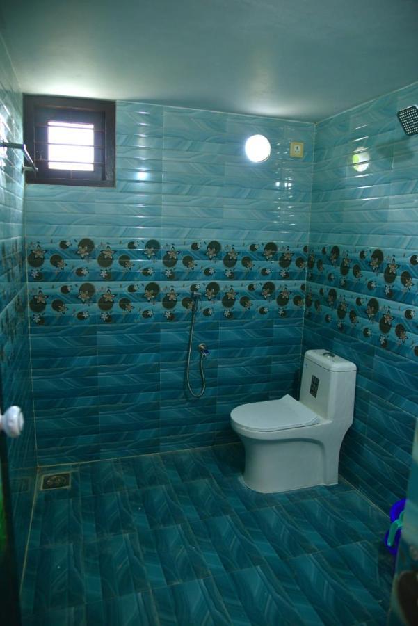 Aqua Green Home Stay Munroe Island Bagian luar foto