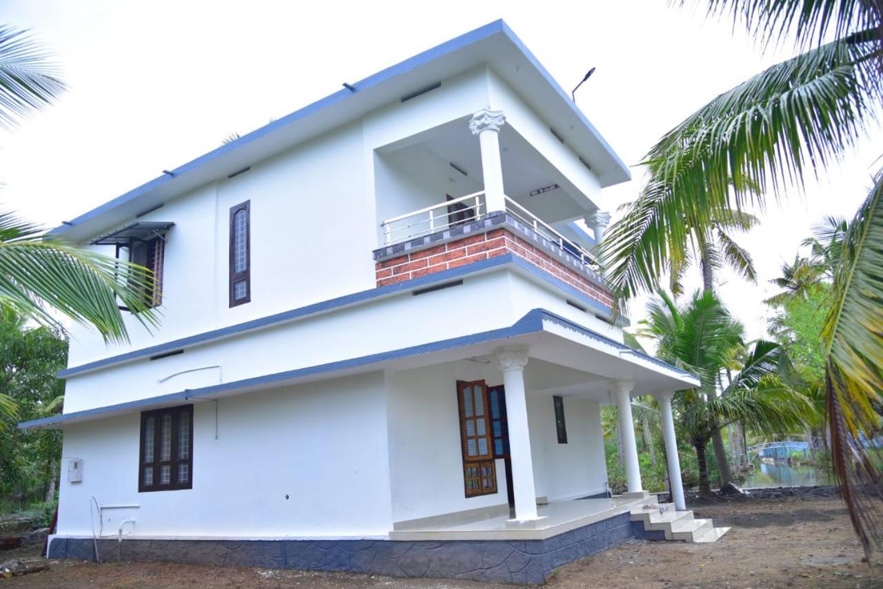 Aqua Green Home Stay Munroe Island Bagian luar foto