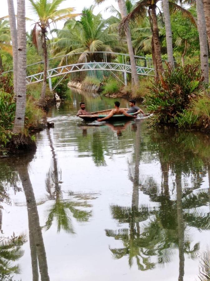 Aqua Green Home Stay Munroe Island Bagian luar foto